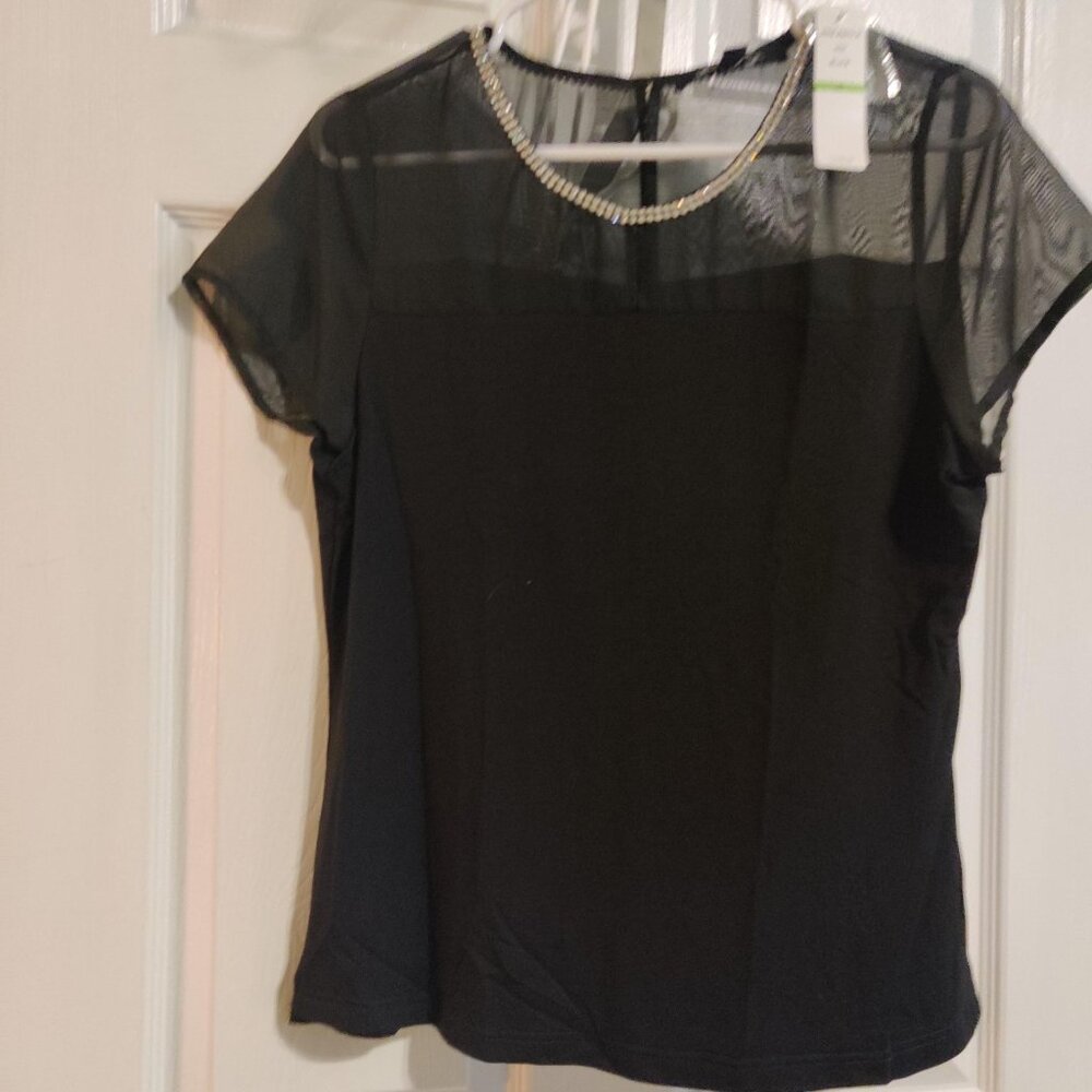 Black stretch knit top with sequined neckline by Anne French